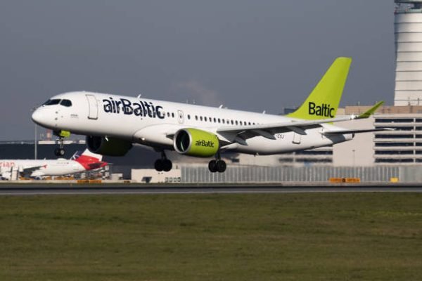Vienna / Austria - April 18, 2019: Air Baltic Airbus A220-300 YL-CSJ passenger plane arrival and landing at Vienna International Airport
