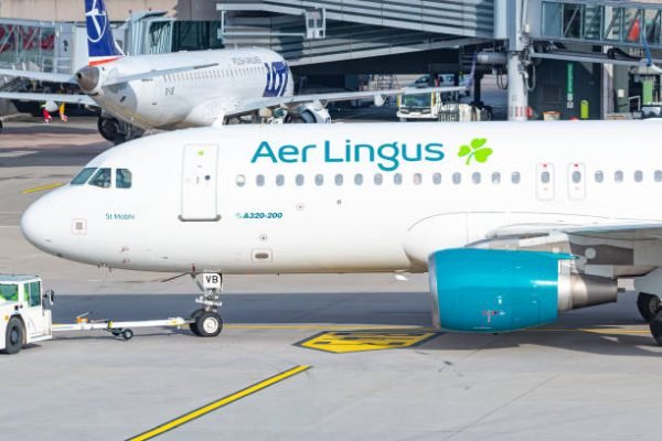 Zurich, Switzerland - February 1, 2020: Aer Lingus Airbus A320 airplane at Zurich airport (ZRH) in Switzerland. Airbus is an aircraft manufacturer from Toulouse, France.