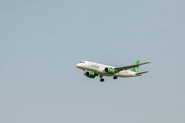 22 august 2024, Brussels, Belgium. View on airplane, aircraft from Wideroe with number LN-WEB. Embraer E190-E2, operated by Wideroe landing on Brussels Airport.