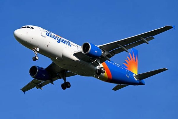 Chantilly, Virginia, USA - June 23, 2025: An Allegiant Air Airbus A320-214 passenger aircraft prepares to land at Washington Dulles International Airport following a flight from Knoxville, Tennessee.