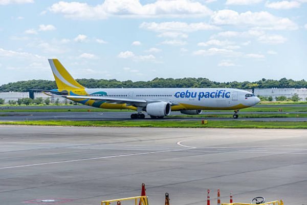 Tokyo, Narita, Japan - July 25, 2025: Cebu Pacific Airbus A330, registration number RP-C3907 arriving at Tokyo Narita International Airport