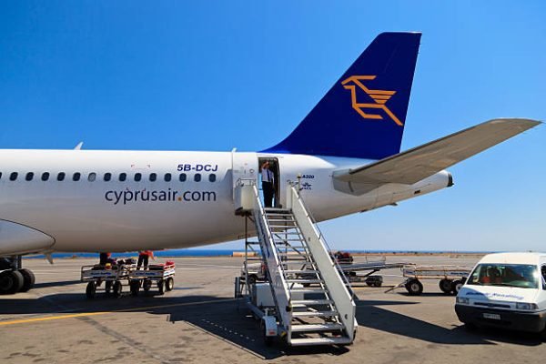 Crete, Greece - June 17, 2013: Cyprus airways airbus A320 loaded at Heraklion airport. yprus airways reported 56 mln Euro loss in 2012 and is to raise funds to continue operations.