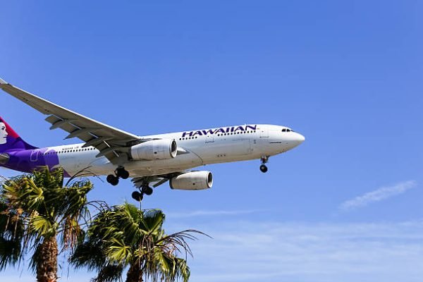 Los Angeles, USA - May 30, 2015: An airplane of Hawaiian Airlines landing at Los Angeles International Airport.