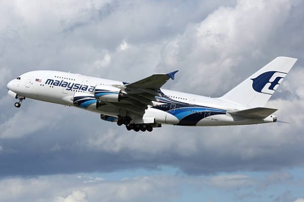 London Heathrow, United Kingdom - August 28, 2015: A Malaysia Airlines Airbus A380 with the registration 9M-MNE taking off from London Heathrow Airport (LHR) in the United Kingdom. The Airbus A380 is the world's largest passenger airliner. Malaysia Airlines is the flag carrier airline of Malaysia based in Kuala Lumpur.