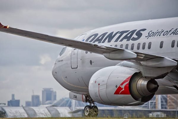 Sydney,Australia - February 20, 2016: A QANTAS Boeing 737 taxies towards the terminal after landing at the city's airport. QANTAS is the flag carrier for Australia.